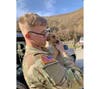 U.S. Army Specialist Hicks holds his puppy, Soap. Hicks rescued Soap while stationed overseas. Paws of War, a Nesconset-based organization, is trying to help get Soap relocated to the United States.