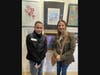 Sophomore Katie Gardella with teacher Christine Driscoll and her work “Field of Blues.”