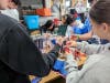 Smithtown High School West students handed out care packages to veterans at the Long Island State Veterans Home in Stony Brook.