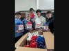 Smithtown High School West students handed out care packages to veterans at the Long Island State Veterans Home in Stony Brook.
