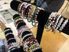 College bracelets "made with love" by Walt Whitman Life Skills students for high school students heading to college.