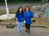 Volunteers clean the Centerport Senior Beach House on Saturday.