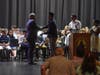 Superintendent Robert Banzer accepts his surprise “Heart of the Tiger” award from senior Samuel Rosenfeld-McMahon.