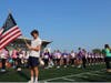 The Northport High School Tiger Marching Band, Flagline and Tigerettes prepare
for their performance at the annual Relay for Life event.
