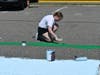 Hauppauge High School students decorated their parking spaces with painted designs for the upcoming school year.