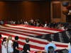 Hauppauge High School held the American flag across the auditorium during a ceremony to commemorate the 9/11 attacks.