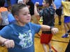 Accompsett Elementary fourth and fifth graders dancing during “KerboomKidz” event on Sept. 14.