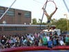A circus performer with Walt Whitman HS Staff at last year’s Homecoming Carnival. This year's homecoming festivities are scheduled for Friday and Saturday.