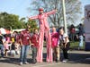 A circus performer with Walt Whitman HS Staff at last year’s Homecoming Carnival. This year's homecoming festivities are scheduled for Friday and Saturday.