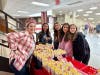 Gina Keely passed out popcorn at Nesaquake Middle School’s recent “Popped For Paige” fundraiser benefitting the Paige Elizabeth Keely Foundation.