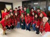 Smithtown High School East Chamber Choir visited elementary and middle schools and sang holiday songs to the younger students.