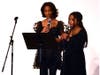 Oldfield Middle School seventh graders Nadia McKelvey and Alani Spence read poems “Black History Month” and “I Am the Black Child” at Harborfields’ annual districtwide Black History Celebration.