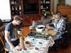 Patient care volunteer and Army veteran Charles DeBarber spends time with fellow Army veteran and hospice patient Albert Sherard preparing seedlings for planting a deck garden. 