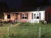 Anne Arundel County police officers have arrested the homeowner in a suspicious Glen Burnie house fire.