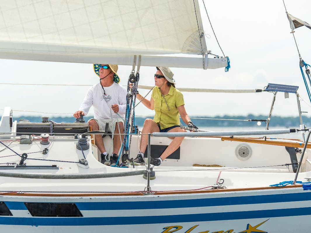 Pat and Amy Teeling sail on their boat.