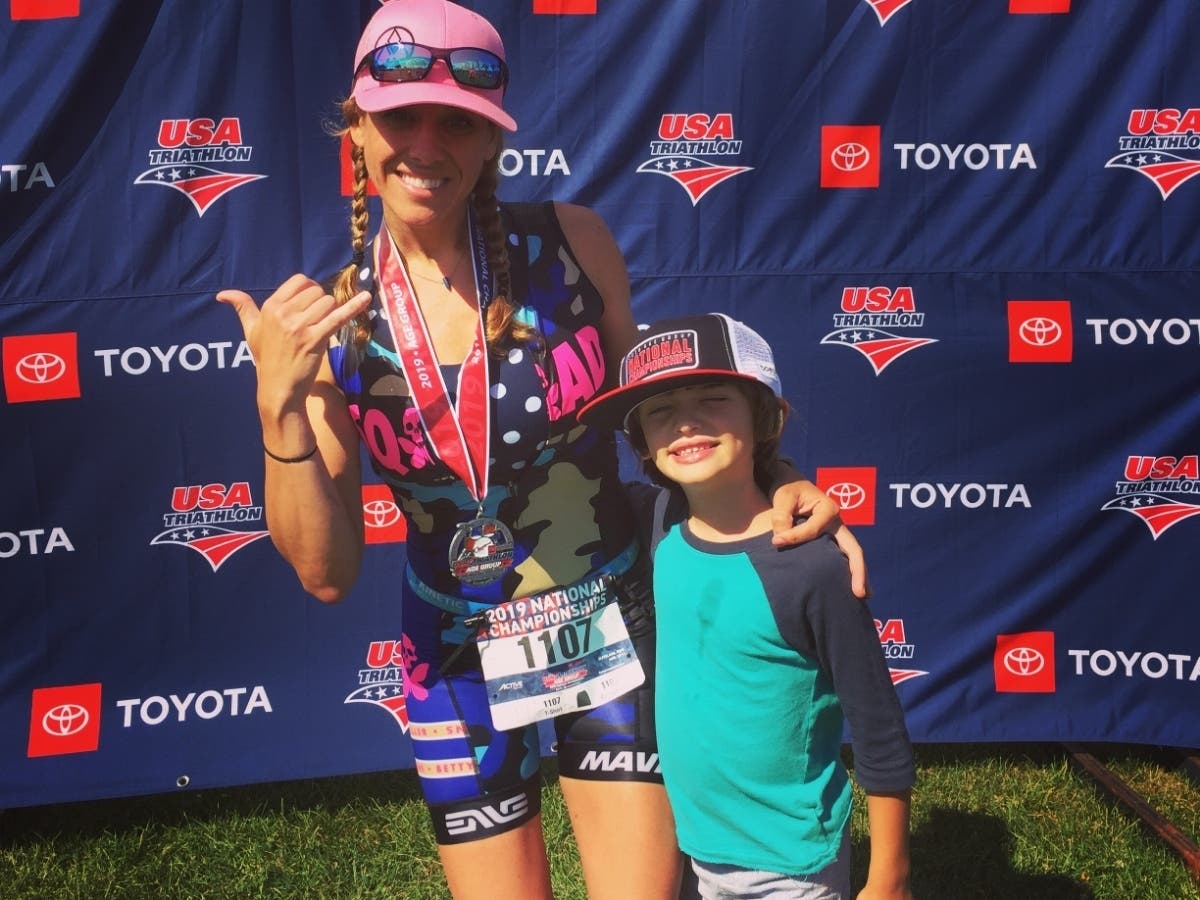 Courtney Smith just started competing in triathlons this year with her son, her inspiration, cheering her on.