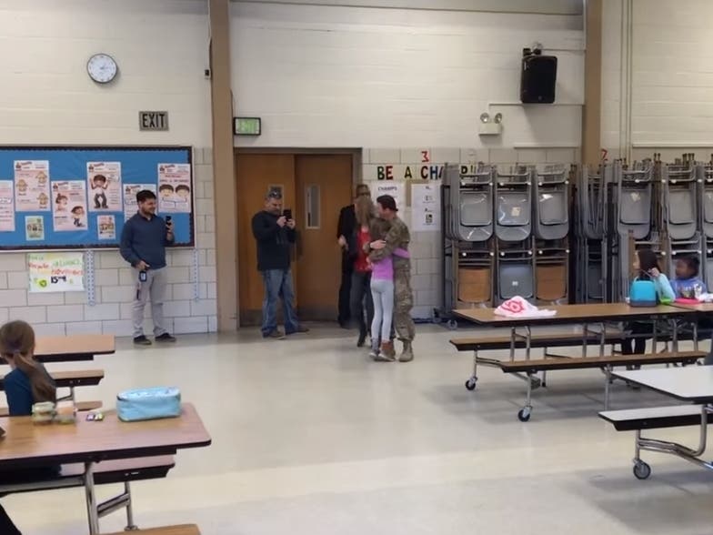 Kaylee Post couldn't believe it when her mom, who has been deployed in Afghanistan for the past nine months, walked through her lunchroom.