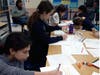 Local Girl Scouts helped students from Howard County learn about financial matters, obtain school supplies and warm winter clothes.