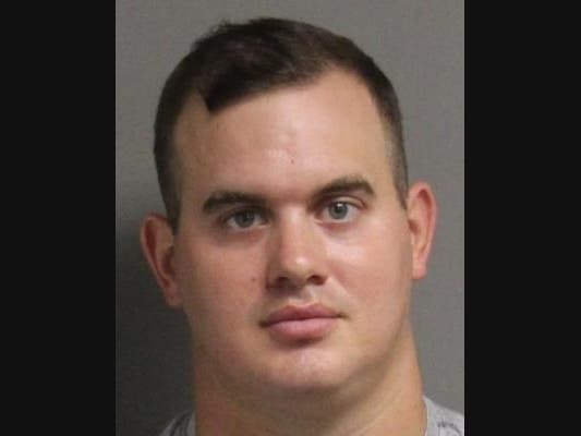 Hyattsville police officer Mitchell Joseph Lowery, 29, has been suspended without pay after he was charged with assault stemming from an argument at a Columbia pool.