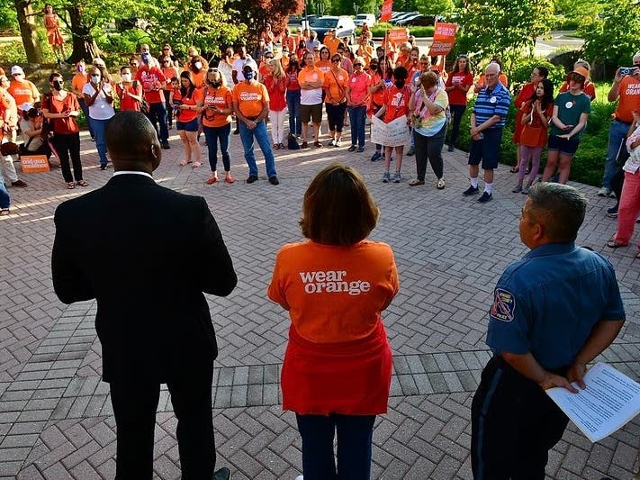 Howard County Executive Calvin Ball directed the George Howard Building to be lit orange all weekend to honor victims of gun violence.