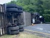Two injuries were reported when a car and a tractor-trailer collided in Abingdon, causing the semi to block lanes of traffic. The county hazmat team also responded to the call.