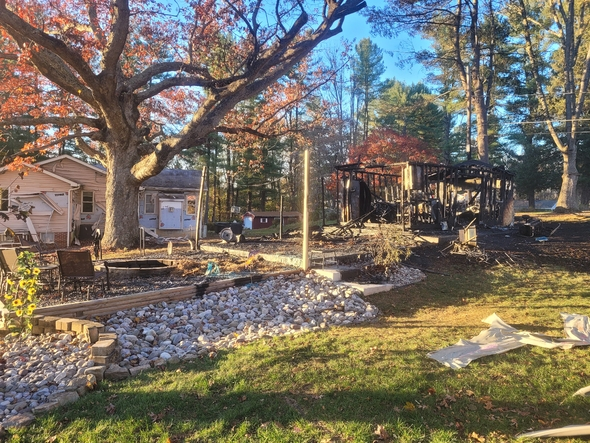 The Forest Hill resident suffered minor burns while attempting to put out the fire that destroyed a detached garage and patio furniture. The Office of the State Fire Marshal has estimated the loss at $35,000.