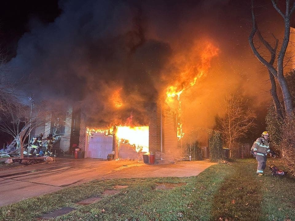 A firefighter was taken to the hospital to be checked out after helping battle a garage blaze at a home in Largo early Tuesday morning. 