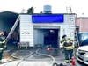 Prince George's firefighters battled a multi-vehicle fire at a repair shop Sunday and another vehicle fire inside a Laurel commercial garage Sunday. 