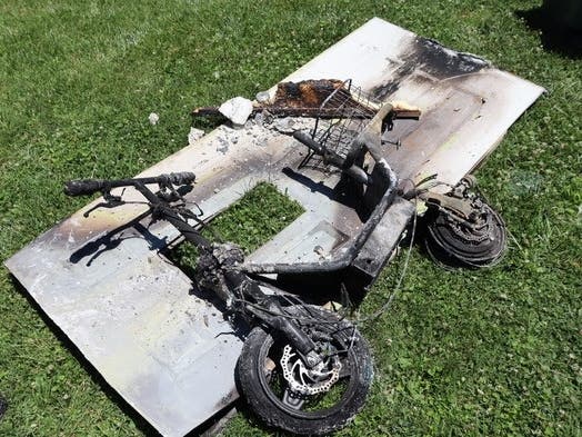 A resident was charging an e-bike using a new aftermarket charger. Within minutes of starting to charge the e-bike, she heard popping sounds and found the e-bike on fire. She tried to put out the fire with a fire extinguisher, but that didn't work.