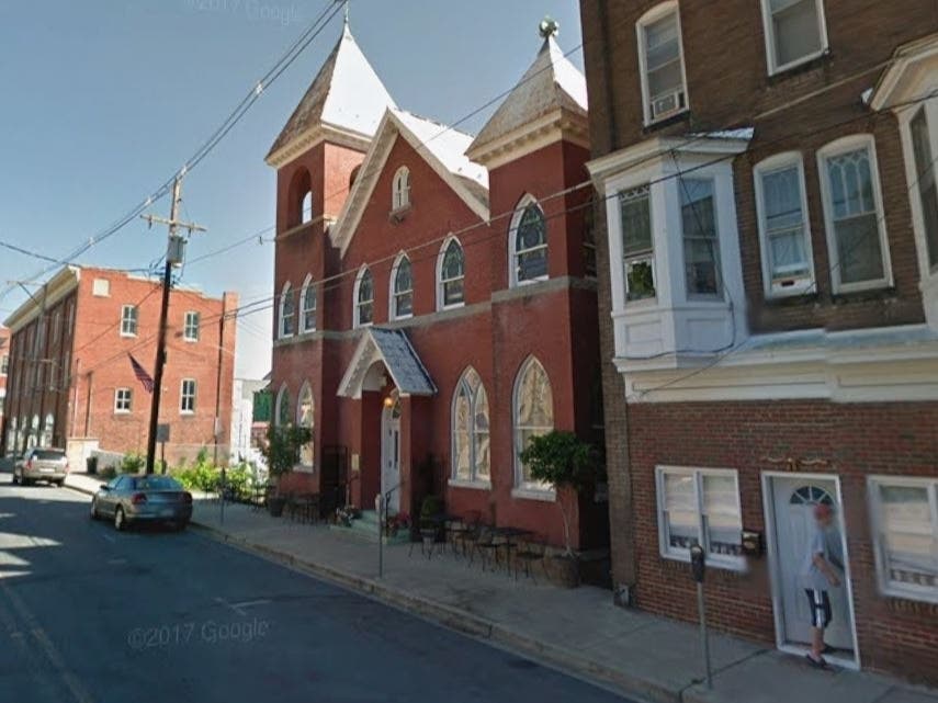 Beans in the Belfry is located in an old converted church built in 1910 that retained the original stained glass windows. The eatery offers live folk, bluegrass and Celtic music as part of the dining experience, along with couches and antique church pews.