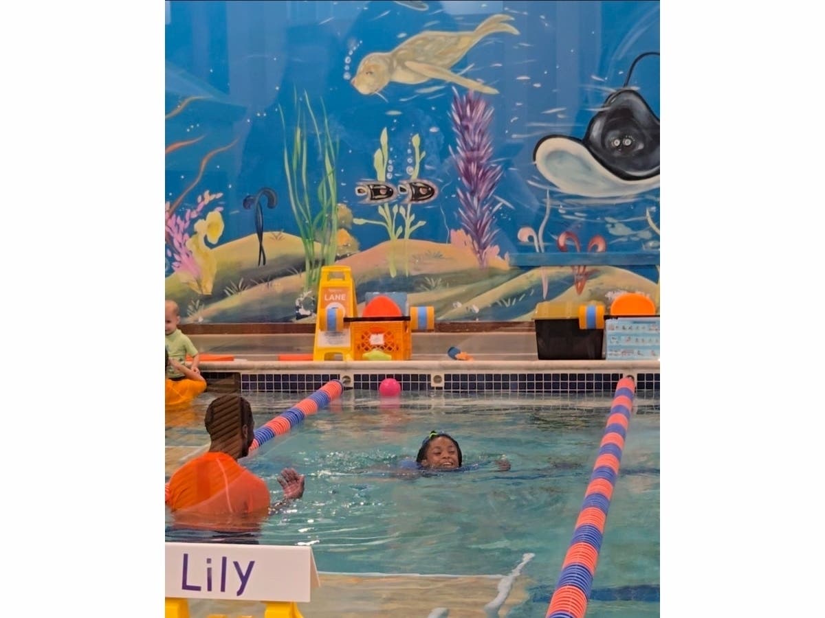 Mom Ebony Crawford-Sealy and her husband are parents to Xavier who has level three autism. They enrolled Xavier in the Golden Learners program at Goldfish Swim School Columbia. She and her husband also have written a book about raising Xavier.