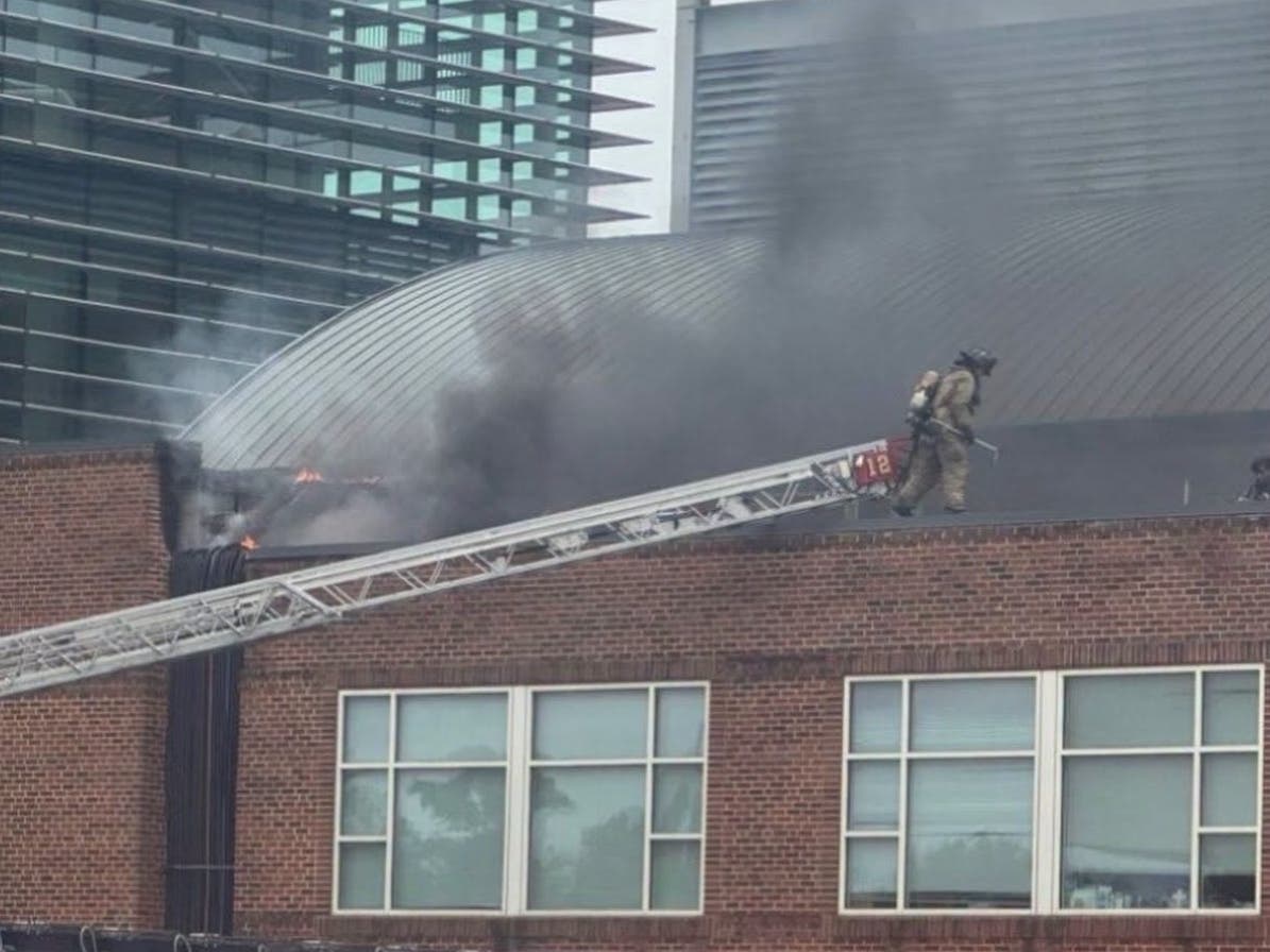Crews arrived at the two-story building located in the 8100 block of Paint Branch Drive shortly after noon Aug. 22. Firefighters found fire shooting through the roof of a building, according to the Prince George's County Fire/EMS Department.
