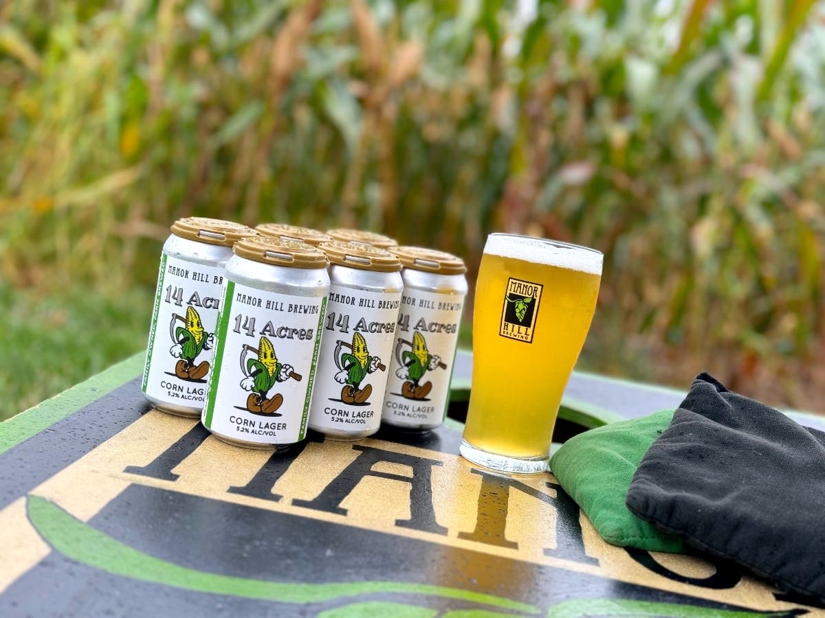 Brewed specifically for Corn Fest each year in limited quantities, 14 Acres Corn Lager was named after the 14-acre corn field that provides the backdrop for Corn Fest at Manor Hill. Described as crisp and easy to drink with numerous flavors.