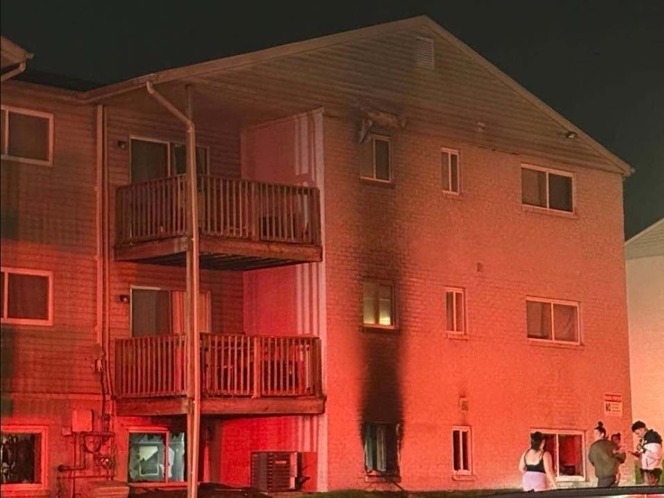 Twenty adults and eight children have been displaced, and two cats and a pet turtle were killed. Firefighters rescued two people from an upper floor balcony and pulled one person through a window.