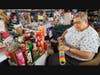 Virginia Kalensky – Rummage Sale volunteer and member of St. Peter’s UCC in Skokie – sorts holiday items for the rummage sale. Items will be organized in sections and priced to provide inexpensive, good-quality options for shoppers. 