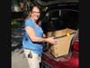 Annie Noorts – Rummage Sale Committee Chairperson and member of St. Peter’s UCC in Skokie – unloads donations from a family moving out of state who appreciated St. Peter’s willingness to come pick items up.