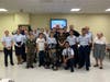 Members and visitors from Challenger 1 Cadet Squadron pose with R2-Q5