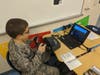 A cadet experiences solo flight on one of the flight simulators.