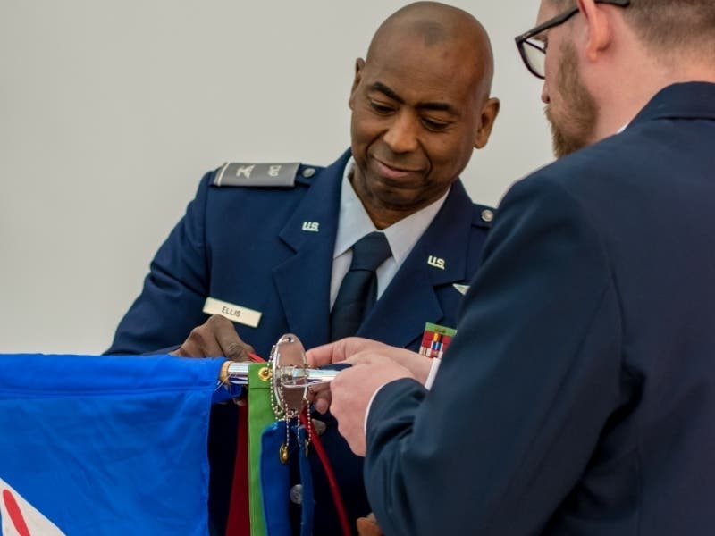 Col Janon D. Ellis presents the Unit Citation Streamer to Challenger 1 Cadet Squadron