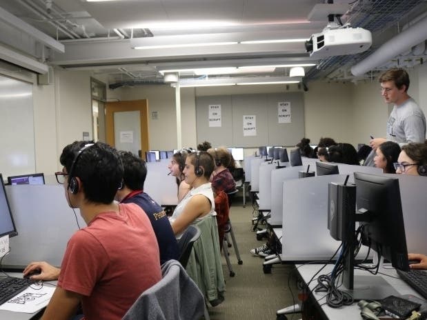 Students make calls for the latest Goucher Poll in the Sarah T. Hughes Field Politics Center on a recent Friday night.