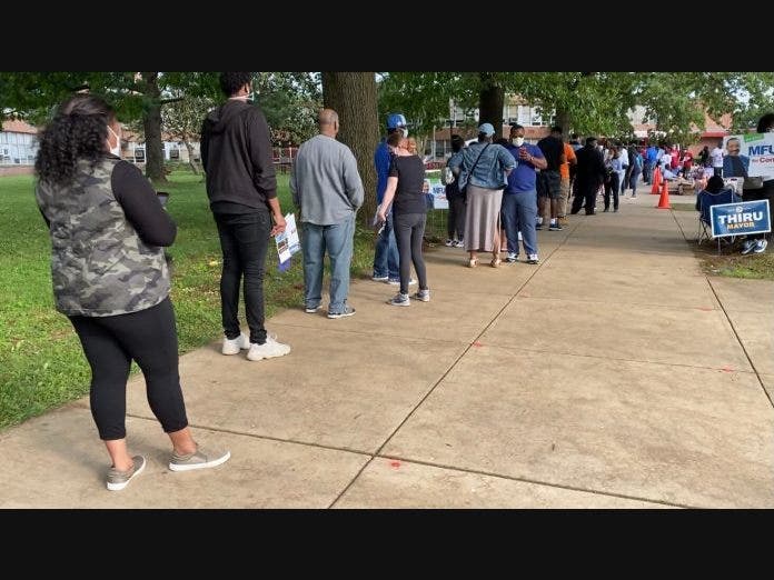 Baltimore City voters standing in line at Edmondson High School to vote in the 2020 primary election. Photo by Hannah Gaskill