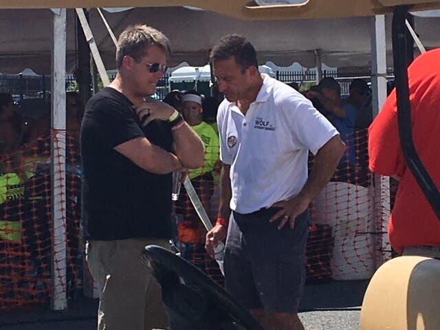 Len Foxwell of the Maryland comptroller's office (left) talks with Republican attorney general candidate Craig Wolf at the Tawes Crab and Clam Bake in 2018.