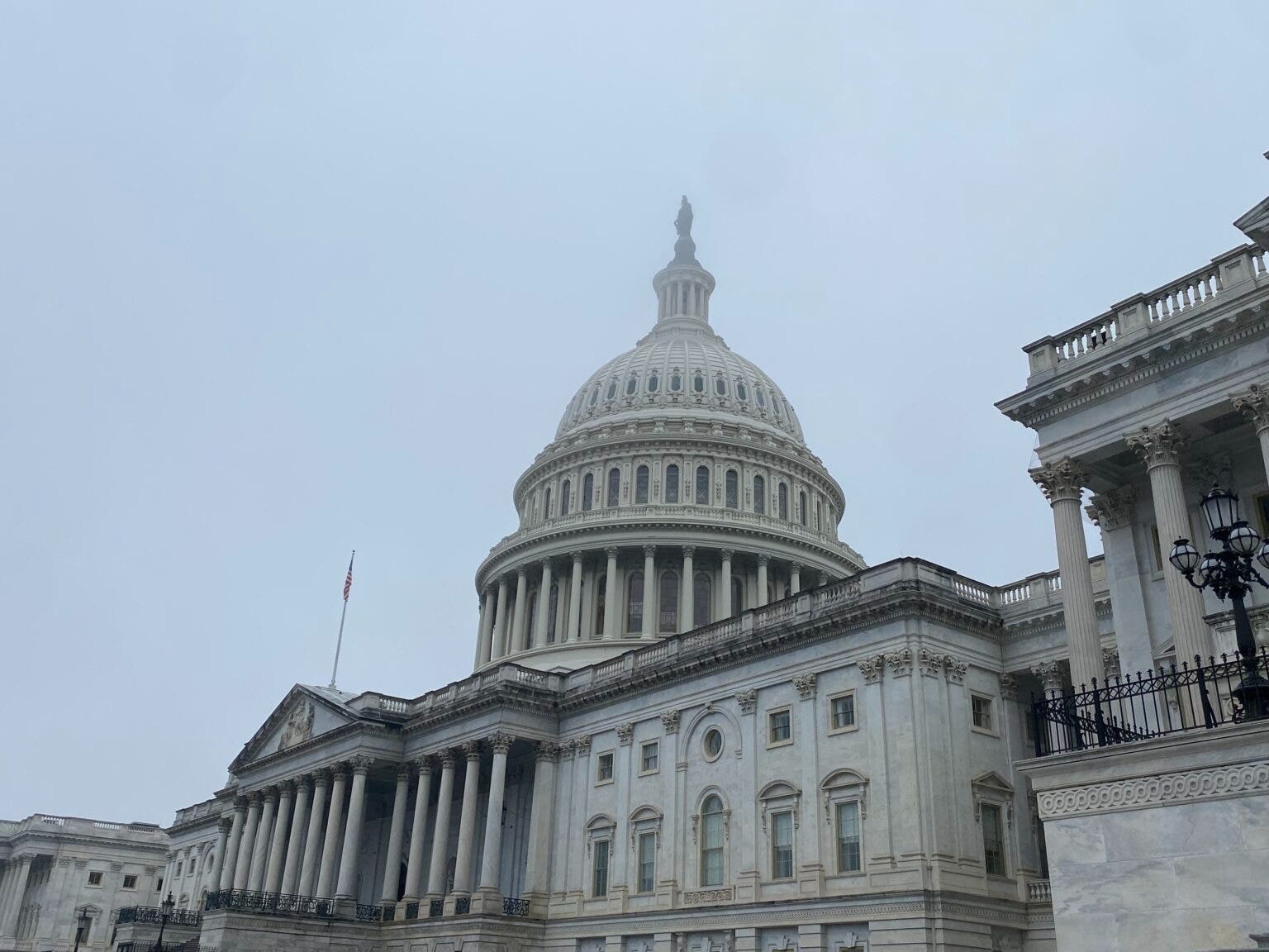 The U.S. Capitol building in Washington, D.C., is pictured in a December 2024 fog. Maryland's congressional elections, often tame affairs, are heating up for 2026, experts say. 