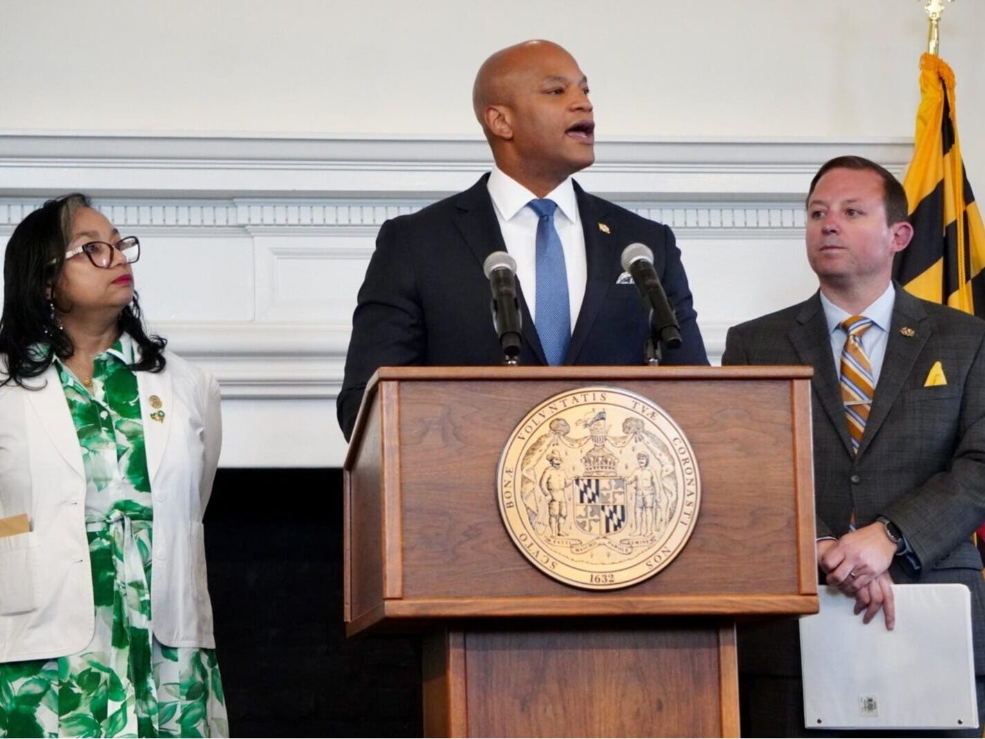 Gov. Wes Moore (D) speaks in support of the of the Utility RELIEF Act hours before its passage Monday, flanked by House Speaker Joseline Peña-Melnyk (D-Prince George’s and Anne Arundel) and Senate President Bill Ferguson (D-Baltimore City). 