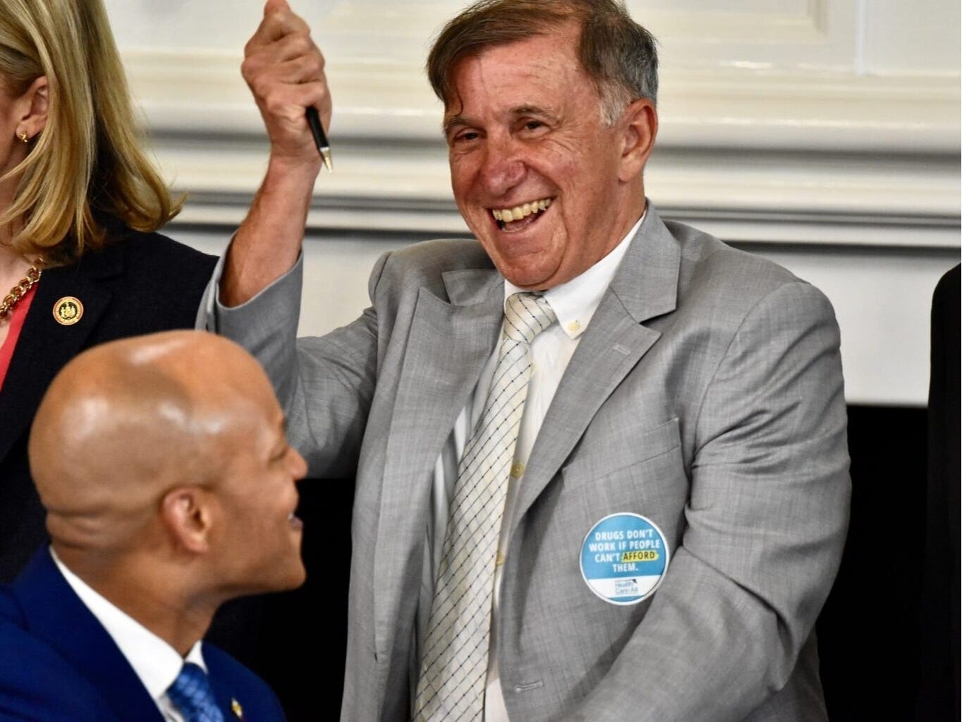 Vincent DeMarco, president of Maryland Health Care for All, celebrates the governor's approval last year of a bill that would expand the reach of the Prescription Drug Affordability Board.