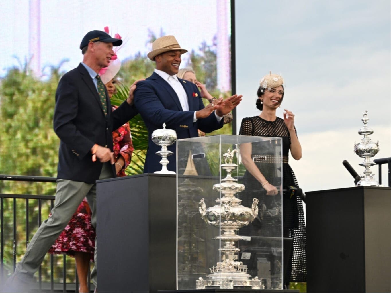 Gov. Wes Moore with the Woodlawn Vase trophy, part of the Preakness holdings the state has acquired, after the 151st running of the Preakness at Laurel Park this year.