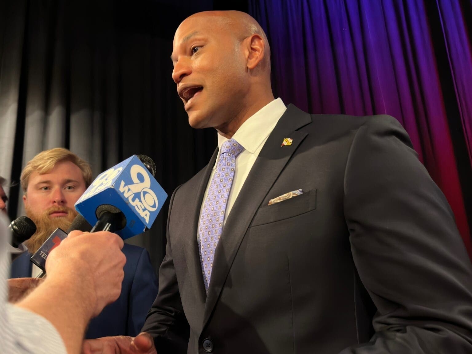 Gov. Wes Moore (D) speaks to reporters after his debate with Republican gubernatorial nominee Dan Cox on Oct. 6, 2026, at Maryland Public Television. 