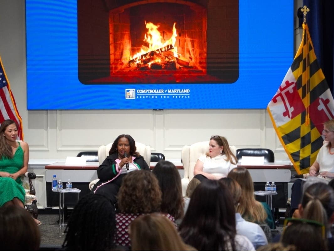 Comptroller Brooke Lierman, right, invited women's advocates and laid-off federal workers Monday to discuss a recent report on how women fare in Maryland's economy. 