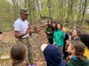 Cadet instructing Troop 301 on tourniquet application