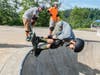 Scouts performing skateboarding stunts